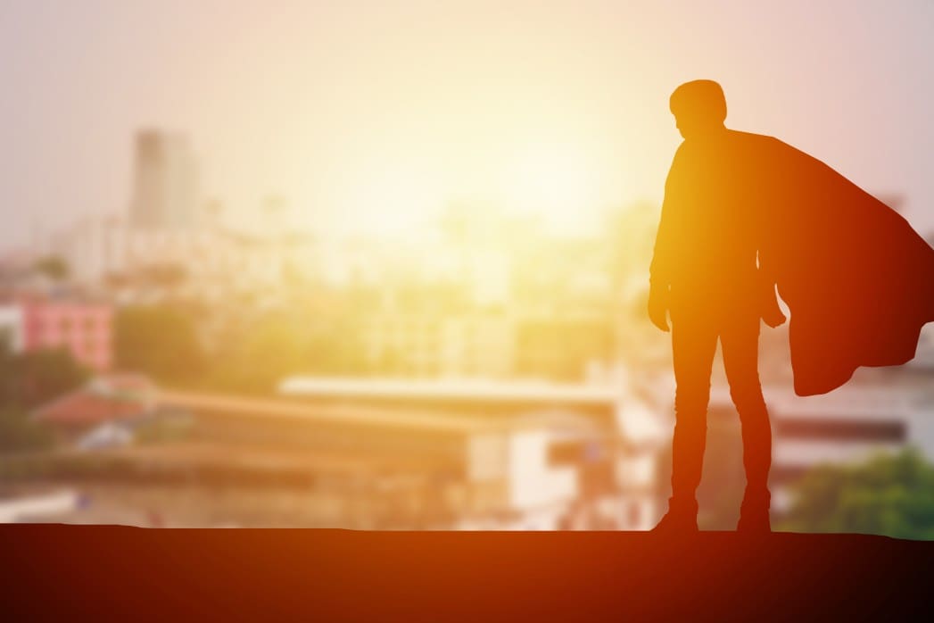 silhouette-of-smart-successful-males-man-wearing-like-superhero-standing-on-top-of-building-over_t20_bxLlAX