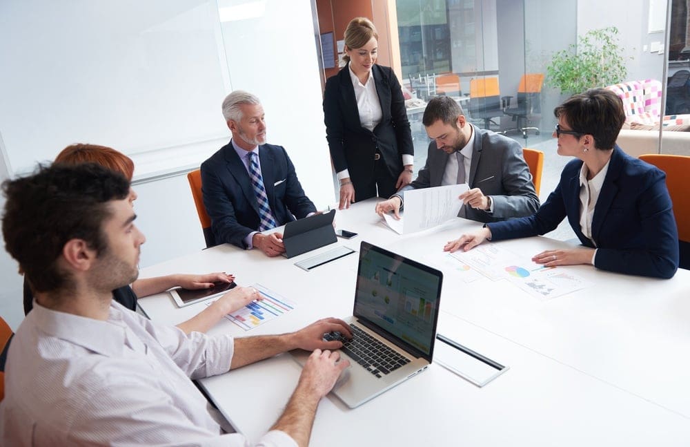 business people group with young adults and senior on meeting at modern bright office interior..jpeg