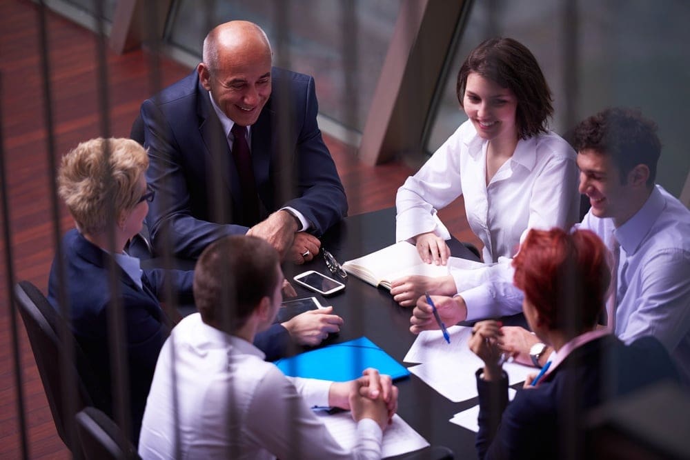 startup business people group have meeting in modern bright office interior, senoir investors and young software developers-2